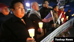 6일 오후 서울 광화문 네거리에서 리퍼트 주한미대사의 쾌유를 비는 촛불집회가 열렸다.