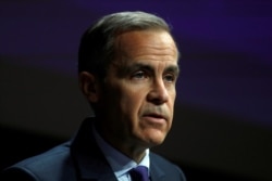 FILE - The Governor of the Bank of England, Mark Carney, speaks to the Scottish Economics Forum, via a live feed, in central London, Britain, March 2, 2018.