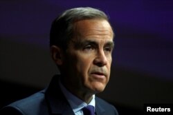 FILE - The Governor of the Bank of England, Mark Carney, speaks to the Scottish Economics Forum, via a live feed, in central London, Britain, March 2, 2018.