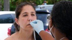 Raquel Heres gets a COVID-19 rapid test to be able to travel overseas, Saturday, July 31, 2021, in North Miami, Fla. Federal health officials say Florida has reported 21,683 new cases of COVID-19, the state's highest one-day total since the start of…