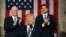 President Donald Trump, flanked by Vice President Mike Pence, left, and House Speaker Paul Ryan arrives on Capitol Hill in Washington for his address to a joint session of Congress, Feb. 28, 2017.