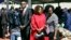 Simba Chikore, Bona Mugabe Chikore and a relative at the late Robert Mugabe's funeral.