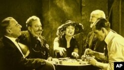 Actress Betty Compson (center) in the 1924 Alfred Hitchcock silent film, The White Shadow. Reels of the long lost film were recently discovered in New Zealand.