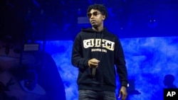 FILE - 21 Savage performs at the Voodoo Music Experience in City Park in New Orleans, Louisiana, Oct. 28, 2018.