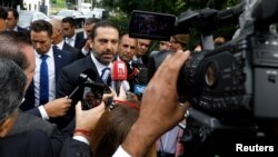 FILE - Lebanese Prime Minister-designate Saad al-Hariri speaks to the media in the Hague, the Netherlands, Sept. 11, 2018. 