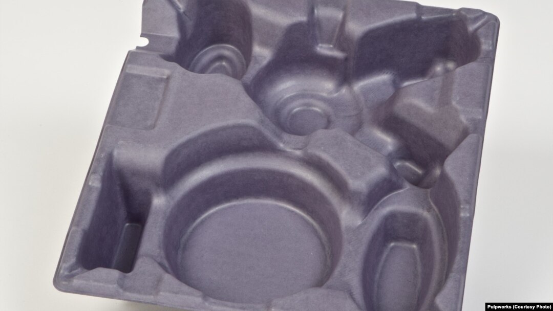 A tray made of pulp fibers is as strong and versatile as a plastic container