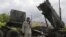 A U.S. soldier stands next to a Patriot surface-to-air missile battery at an army base in Morag, Poland. (File)