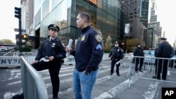 New York City police block off the street near Trump Tower, Monday, April 3, 2023. Former President Donald Trump is expected to travel to New York to face charges related to hush money payments. (AP Photo/Bryan Woolston)