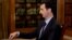 In this photo, which AP obtained from Syrian official news agency SANA and which has been authenticated based on its contents and other AP reporting, President Bashar Assad gestures as he speaks during an interview with Lebanon’s Al-Mayadeen TV, at the pr
