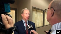 Democratic presidential candidate Tom Steyer speaks to reporters before hosting a town hall in Henderson, Nev., on Nov. 4, 2019.