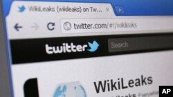 WikiLeaks' Twitter page is seen on a computer screen in Singapore. A U.S. court has ordered Twitter to hand over details of the accounts of WikiLeaks and several supporters as part of a criminal investigation into the release of hundreds of thousands of c