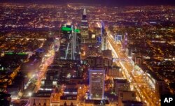 Aerial view of the city of Riyadh seen from the Mamlaka Tower, a 99-story skyscraper, in Riyadh, Saudi Arabia.