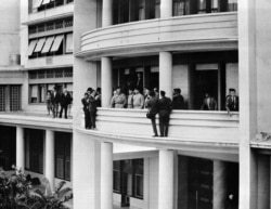 FILE - French Generals Jouhaud, Salan, Challe and Zeller are surrounded by photographers on the balcony of the general delegation in Algiers, after taking power against de Gaulle's policy in Algeria, Apr. 24, 1961. (STF/AFP)