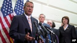 House Speaker John Boehner of Ohio speaks during a news conference on Capitol Hill in Washington, July 9, 2014.