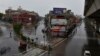 Few vehicles drive through empty roads due to the travel restrictions aimed at containing the coronavirus in Rawalpindi, Pakistan, March 24, 2020. 