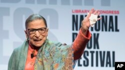 Supreme Court Associate Justice Ruth Bader Ginsburg waves to the audience after speaking at the Library of Congress National Book Festival in Washington, Aug. 31, 2019.