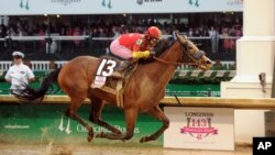 Abel Tasman, ridden by jockey Mike Smith, wins the Longines Kentucky Oaks at Churchill Downs, Friday, May 5, 2017, in Louisville, KY. Longines, the Swiss watch manufacturer known for its luxury timepieces, is the Official Watch and Timekeeper of the 143rd annual Kentucky Derby.