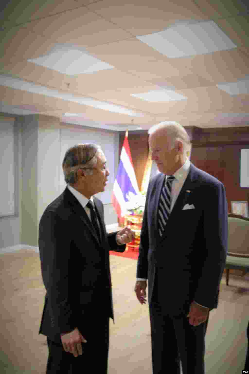 Vice President Joe Biden signs a book of condolences for His Majesty King Bhumibol Adulyadej