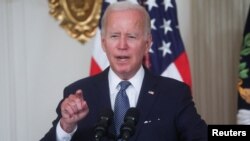 U.S. President Joe Biden signs "The Inflation Reduction Act of 2022" at the White House in Washington