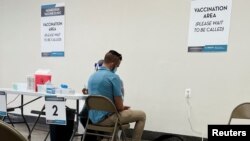 FILE: A man receives a dose of the Jynneos monkeypox vaccine as part of DC Health's first vaccination drive in Washington, U.S., 6.28.2022