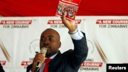 FILE - Opposition leader Nelson Chamisa gestures while addressing a rally of his Movement for Democratic Change (MDC) party in Harare, Zimbabwe, July 11, 2019. 