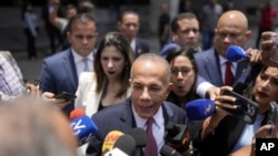 Opposition politician Manuel Rosales speaks to the press as he leaves the Supreme Court in Caracas, Venezuela, Aug. 7, 2024. The country's high court is conducting an audit of the disputed, July 28 presidential election. 