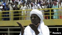 Muslims prays for peace during a rally at the March 26 stadium in Bamako, Mali August 12, 2012.