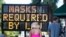 CHARLESTON, SC - JULY 18: People walk along King St. on July 18, 2020 in Charleston, South Carolina. South Carolina is struggling with a high percentage of positive coronavirus (COVID-19) test results.   Sean Rayford/Getty Images/AFP (Photo by Sean…