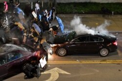 Demonstrators clash with police officers a block from the Public Safety Building in Rochester, N.Y., Sept. 4, 2020, after a rally and march protesting the death of Daniel Prude.