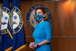 Speaker of the House Nancy Pelosi, D-Calif., pauses as she meets with reporters on Capitol Hill in Washington, Nov. 12, 2020.