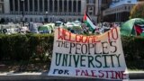 Pro-Palestinian activists demonstrate on the campus of Columbia University in New York City on April 22, 2024. (Photo by Charly TRIBALLEAU / AFP)