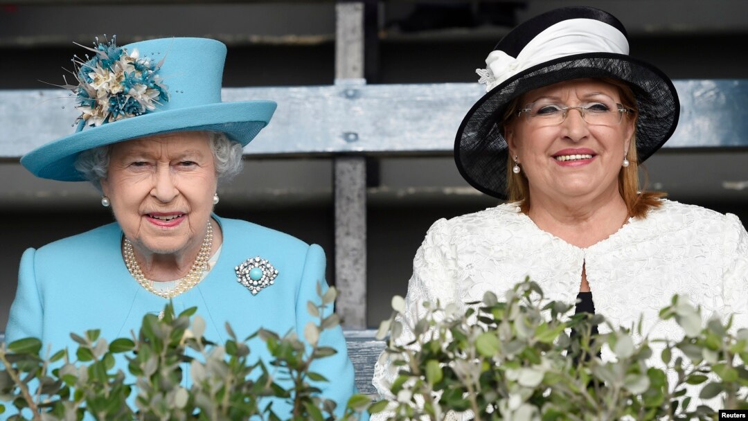 Britain's Queen Elizabeth, left, and Malta's President Marie Louise Coleiro Preca visit Marsa racecourse near Valletta, Malta, Nov. 28, 2015. Malta hosts the Commonwealth Heads of Government Meeting until Sunday. 