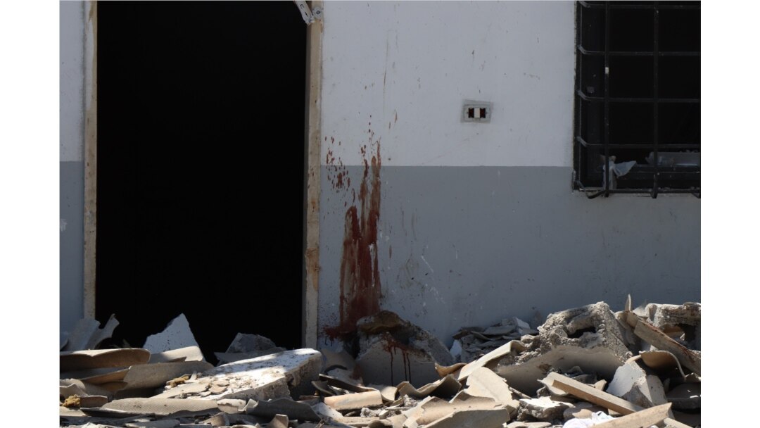 The U.N. says the bombing could amount to a war crime and has called for an investigation on July 3, 2019 in Tripoli, Libya. (H. Murdock)