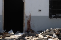 The U.N. says the bombing could amount to a war crime and has called for an investigation on July 3, 2019 in Tripoli, Libya. (H. Murdock)