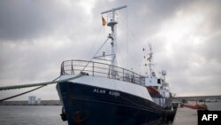 FILE - The Sea-Eye rescue ship, the Alan Kurdi, is seen during its inauguration in Palma de Mallorca, Feb. 10, 2019.