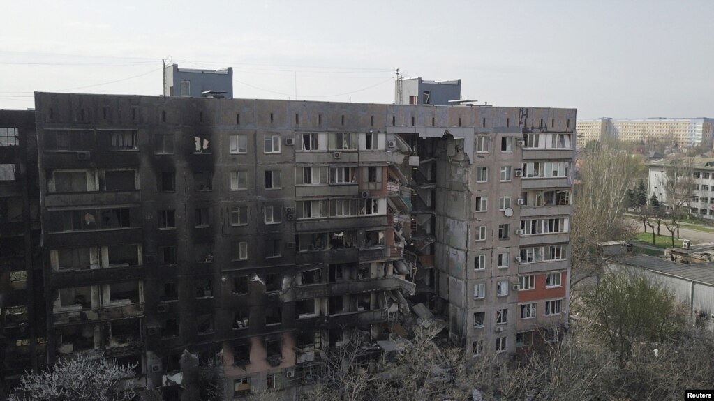 A view shows a residential building damaged during Ukraine-Russia conflict in the southern port city of Mariupol, Ukraine April 19, 2022. Picture taken with a drone. (REUTERS/Pavel Klimov)