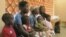 Mothers and chidrem waiting for doctors