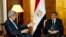 U.S. Secretary of State John Kerry, left, meets with Egyptian President Mohammed Morsi in Addis Ababa, Ethiopia, May 25, 2013. 
