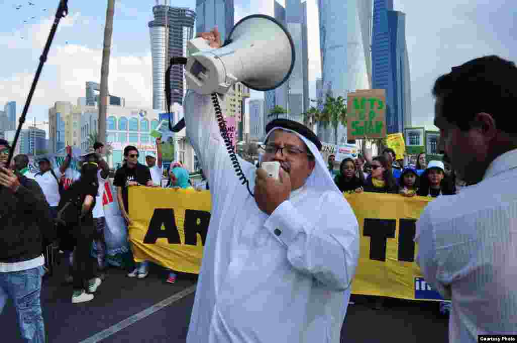 The first climate change rally ever in the streets of Doha Qatar at the UN Climate Change meeting. (Richard Casson, Oxfam)