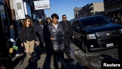 Baltimore mayor Stephanie Rawlings-Blake tours Pennsylvania Avenue as Maryland State Police stand guard in Baltimore, Maryland, April 28, 2015.