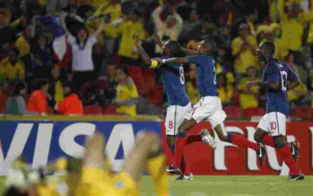 France's Gueida Fofana, left, celebrates with teammates Loic Nego, center, and Gilles Sunu after scoring against South Korea during a U-20 World Cup group A soccer match in Bogota, Colombia, Tuesday, Aug. 2, 2011. (AP Photo/Dolores Ochoa)