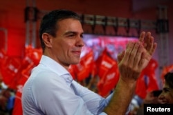 FILE - Spain's Socialist leader and acting Prime Minister Pedro Sanchez attends a rally to mark the kick off his campaign ahead of the general election in Seville, Spain, Oct. 31, 2019.