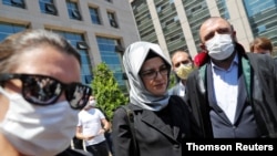 Hatice Cengiz, fiancee of slain Saudi journalist Jamal Khashoggi, leaves the Justice Palace after attending the opening session of a trial of those charged in the killing of Khashoggi at the Saudi Consulate, in Istanbul, Turkey, July 3, 2020.