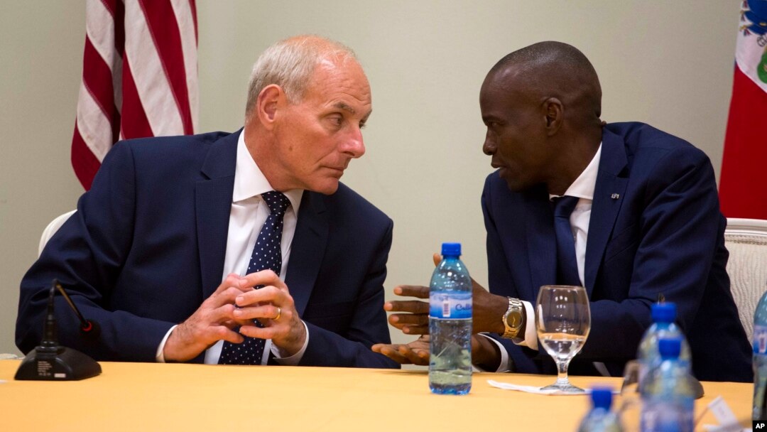 U.S. Homeland Security Secretary John Kelly, left, talks to Haiti's President Jovenel Moise during a news conference at the National Palace in Port-au-Prince, May 31, 2017. 