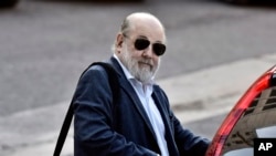 FILE - Argentine Federal Judge Claudio Bonadio arrives to court in Buenos Aires, Argentina, April 3, 2018. Bonadio died, Feb. 4, 2020, in Buenos Aires.