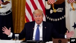 President Donald Trump speaks during a Cabinet Meeting in the East Room of the White House, Tuesday, May 19, 2020, in Washington. (AP Photo/Evan Vucci)