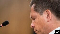 Don Damond, the fiance of Justine Ruszczyk Damond, reads a victim impact statement before the sentencing at the Hennepin County District Court in Minneapolis, June 7, 2019.