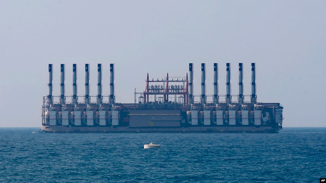 A floating power station waits off the coast at Jiyeh, south of Beirut, Lebanon, July 16, 2018.