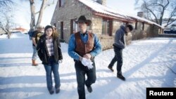 Ryan Bundy, one of the sons of Nevada rancher Cliven Bundy, walks through the Malheur National Wildlife Refuge near Burns, Ore., Jan. 8, 2016.