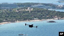 Greece Wildfire DronesA long-range drone equipped with thermal imaging cameras and a sophisticated early warning system patrols over Kavouri beach and nearby woodland, in southern Athens, Greece, Aug. 17, 2023. 